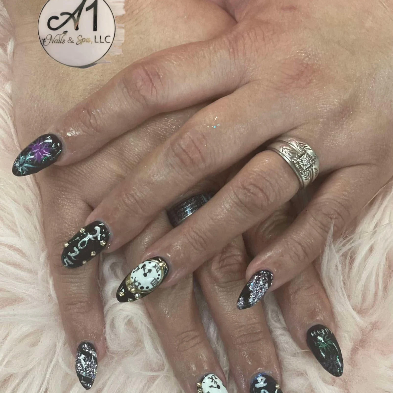 Black, white and green glitter nail art by A1 Nails & Spa