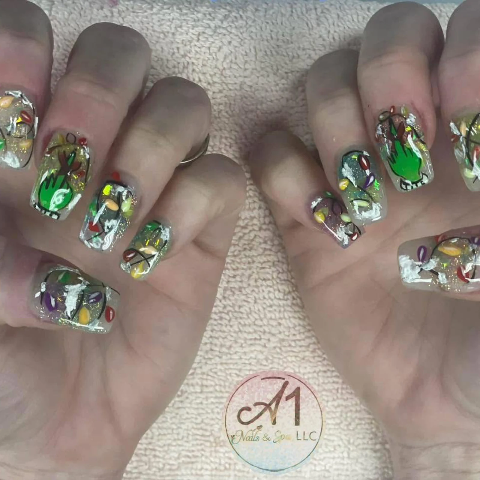 Green abstract nail design by A1 Nails & Spa